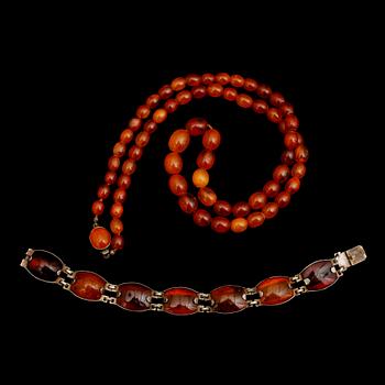 HALSBAND OCH ARMBAND, silver och bärnsten, 1900-tal.