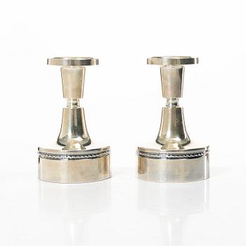 Eric Löfman, a pair of silver candle holders, MGAB, Uppsala, 1970's.