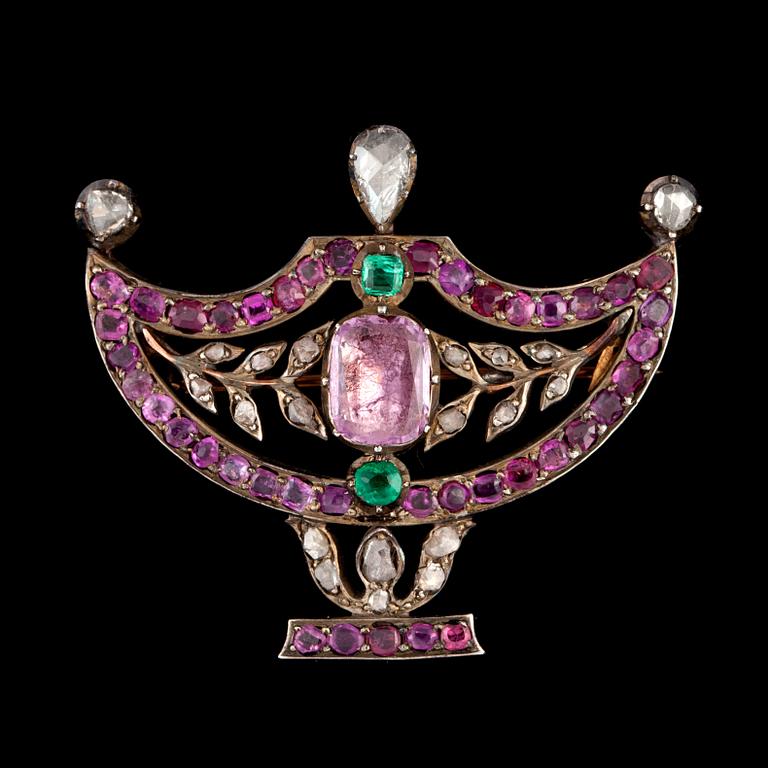 A pink topaz, pink sapphire, emerald and rose-cut diamond brooch.