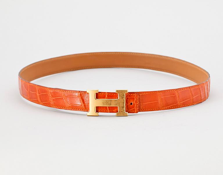 An alligator belt by Hermès.