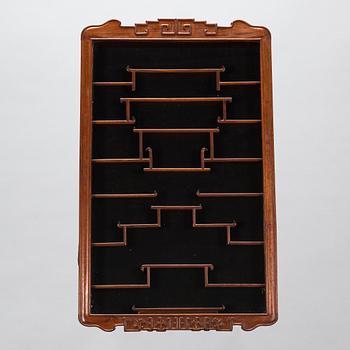 A Chinese 20th century hardwood wall cabinet.