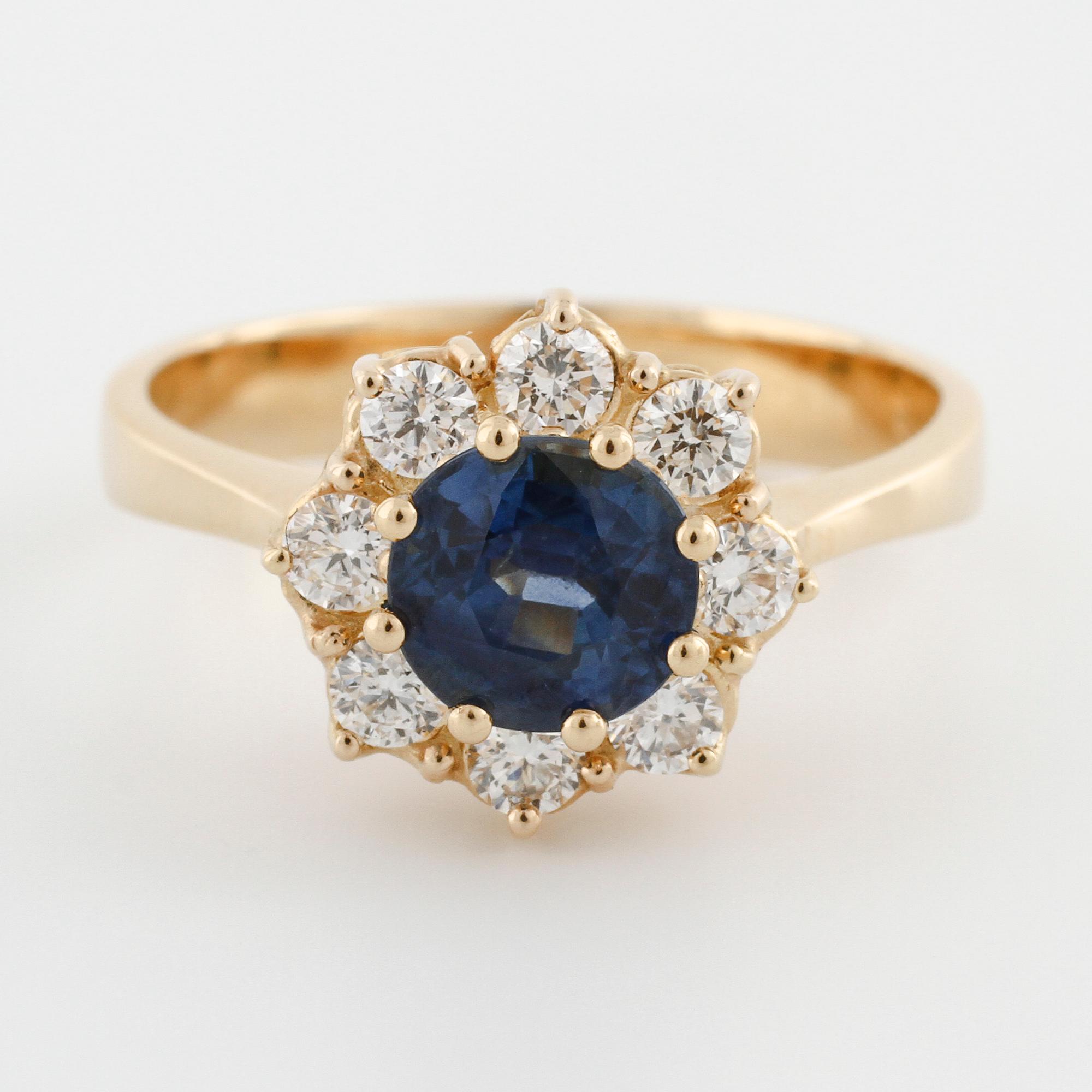 A sapphire and brilliant cut diamond ring.