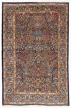 A carpet, old Kerman, ca 279 x 176 cm.