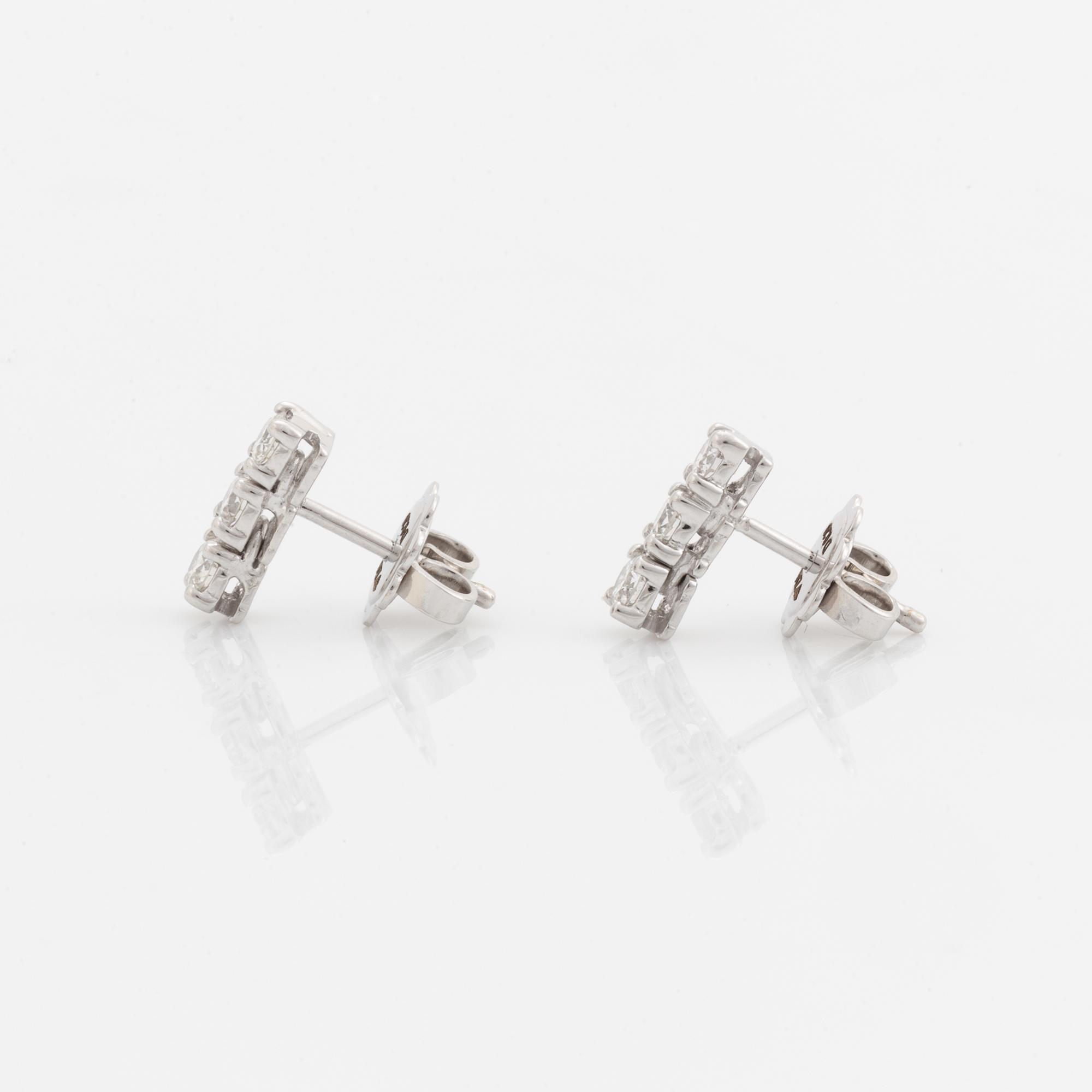 Brilliant-cut diamond earrings.
