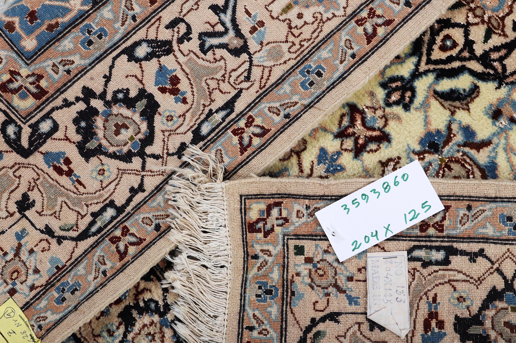 A part silk Nain rug, 9LA, c. 204 x 125 cm.