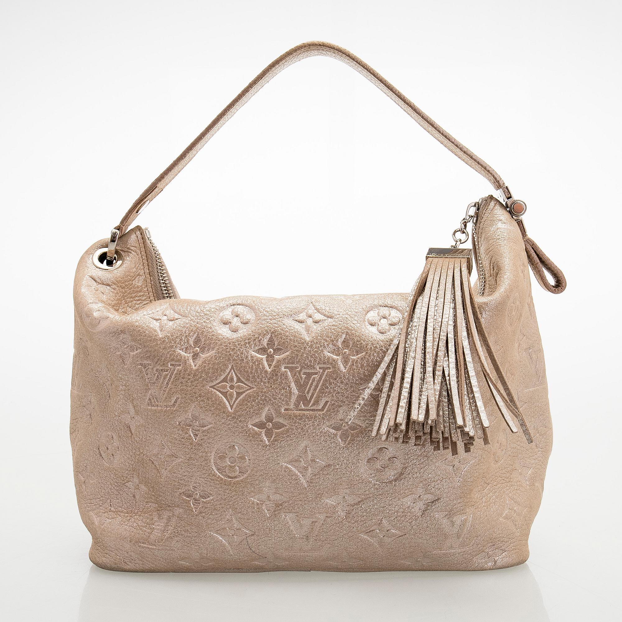 Louis Vuitton, a shimmer 'Halo' bag.