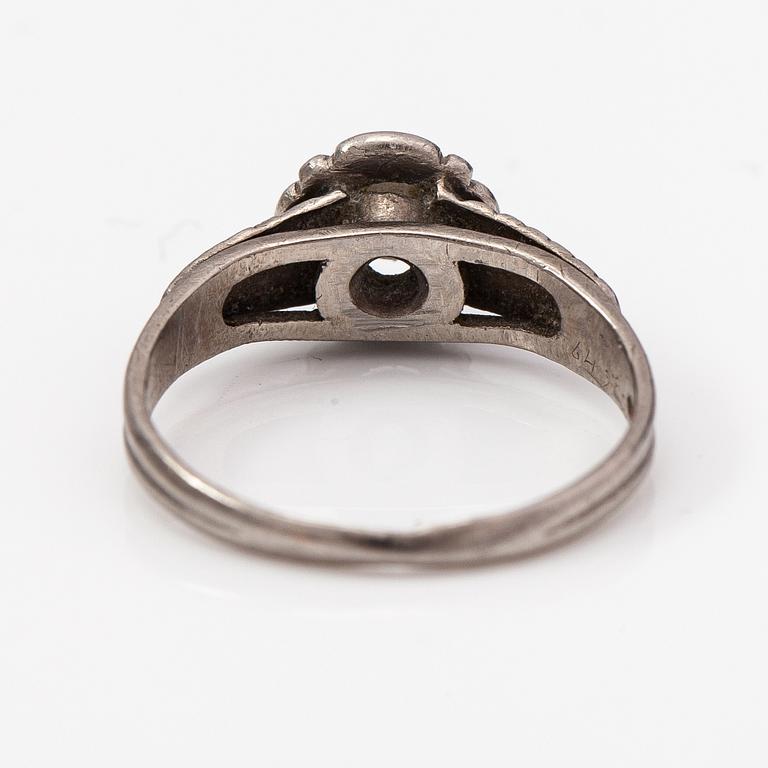 A Tillander, a palladium ring with a ca. 0.23 ct diamond. Helsinki.