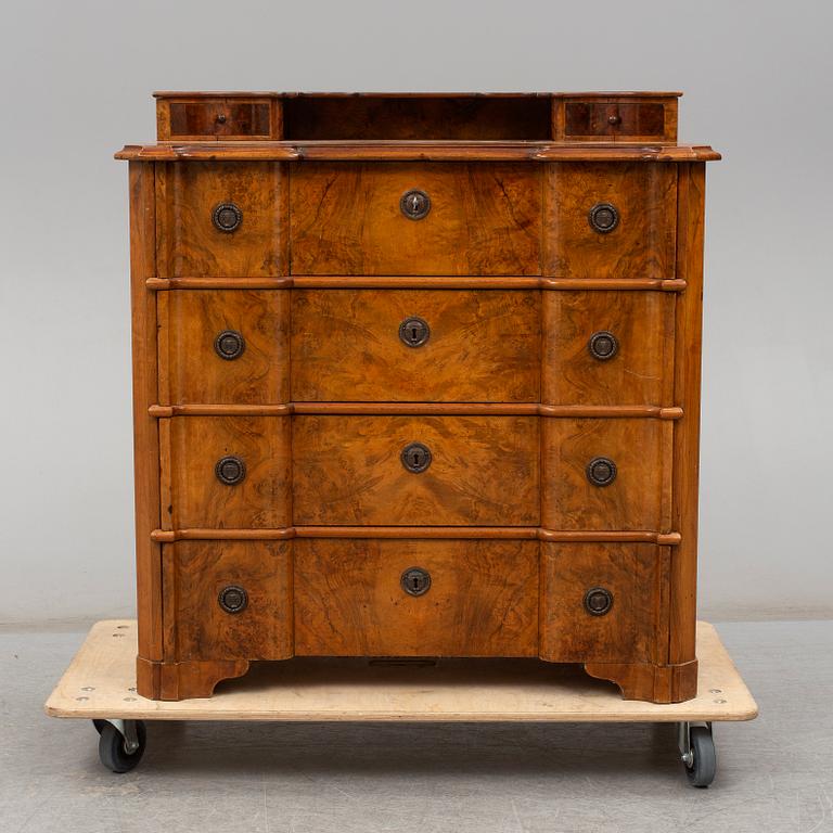 a walnur chest of drawers from the mid 1800's.