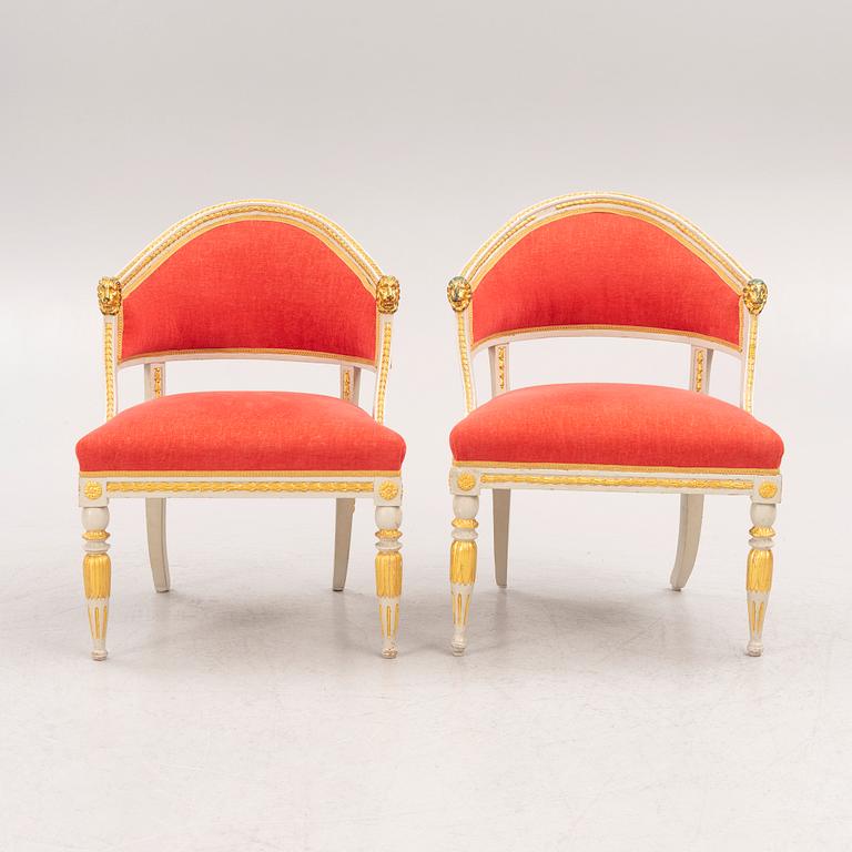 A pair of late Gustavian-style open armchairs, first part 19th century and circa 1900.