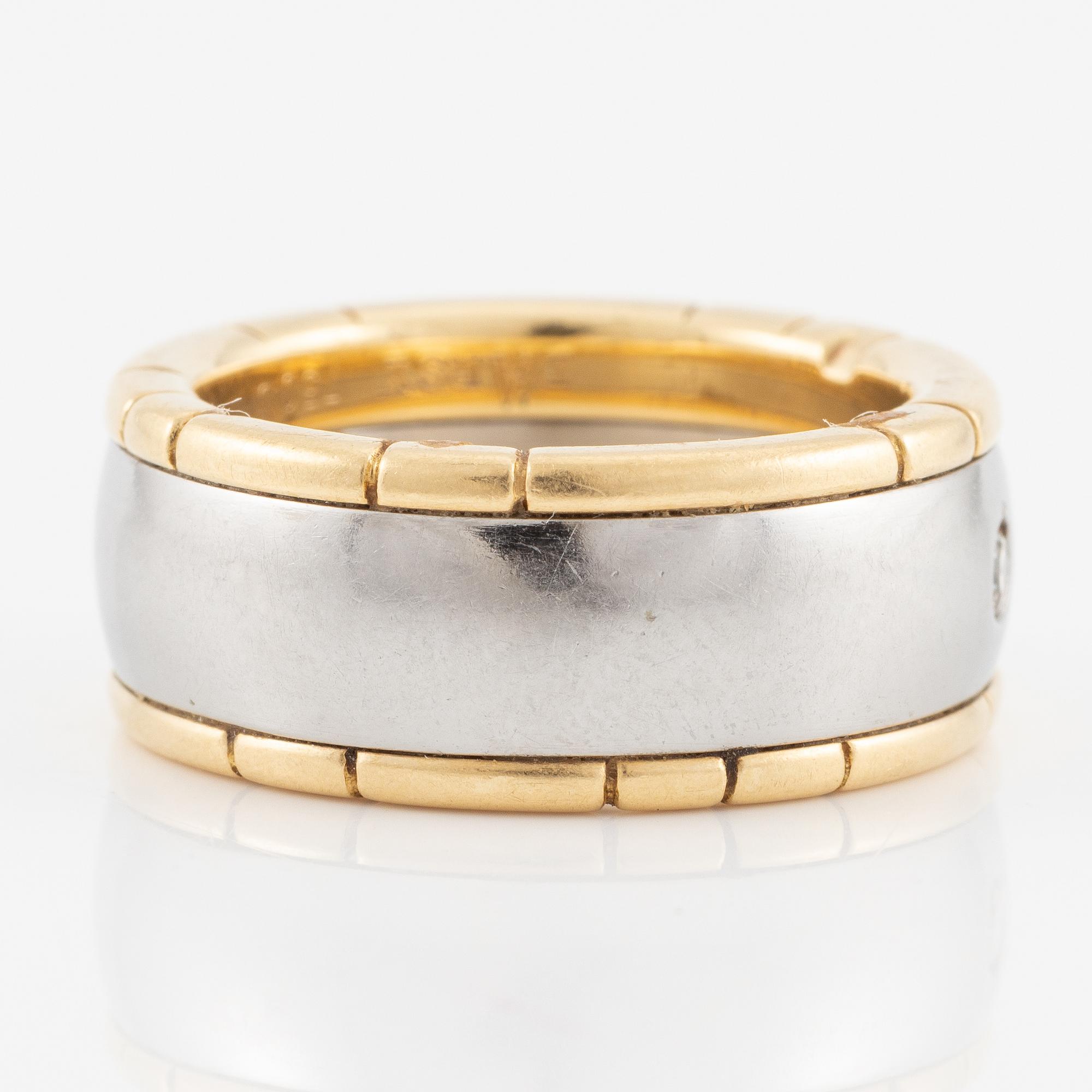 Ring 18K guld och stål med runda briljantslipade diamanter, Darsy.