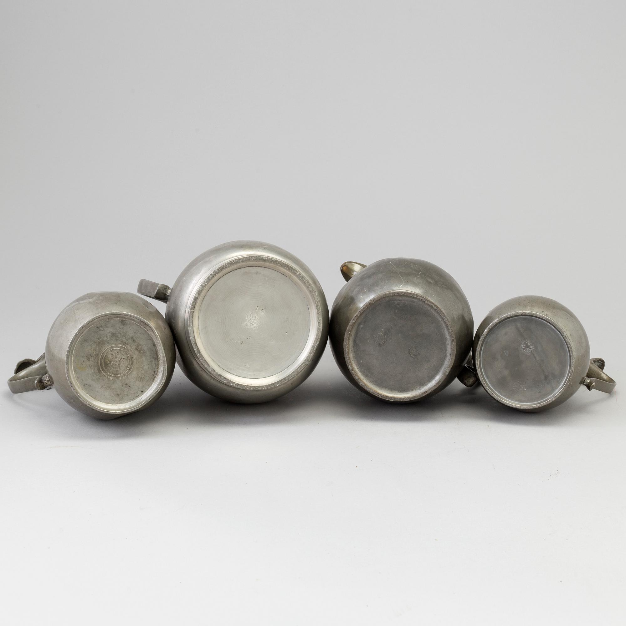 Four 18th century pewter jugs.