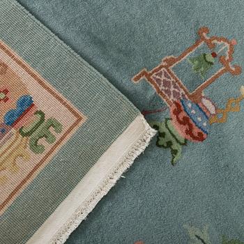 An old Chinese carpet ca 335 x 243 cm.