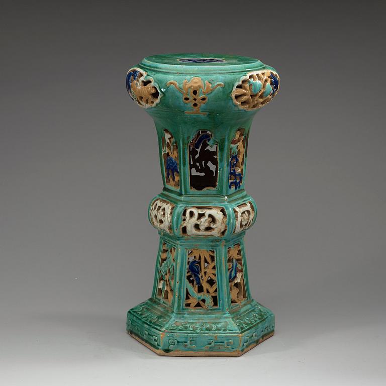 A green glazed Shiwan-ware stool, Qing dynasty, 19th Century.