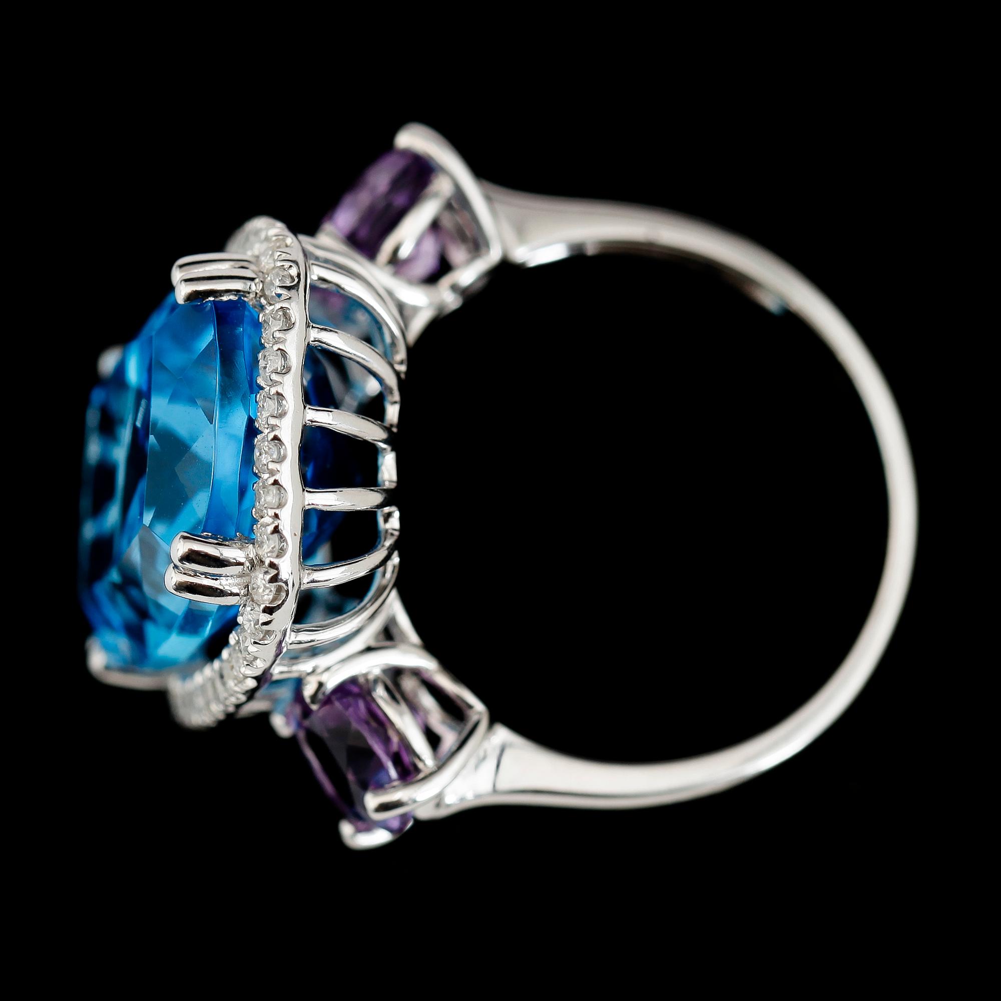 RING, 14K vitguld, blå topas, ametister och diamanter.