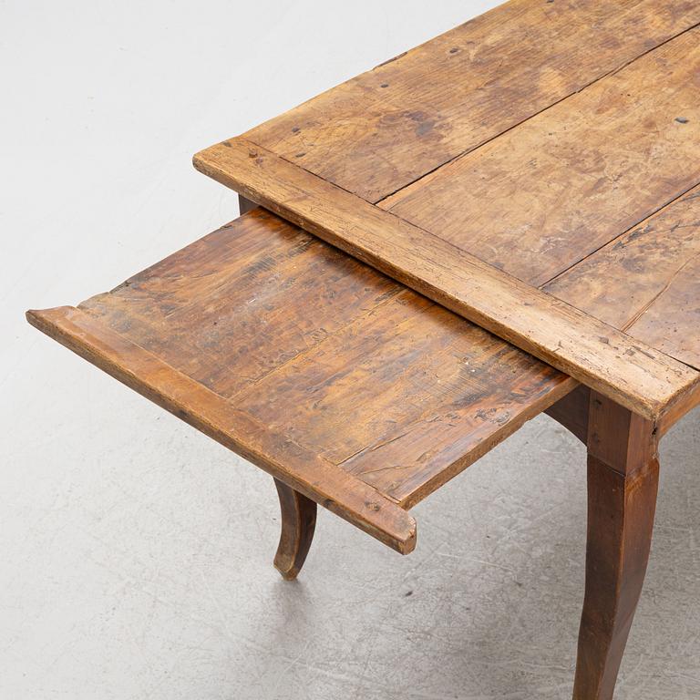 A Rococo Dining Table, 18th Century.