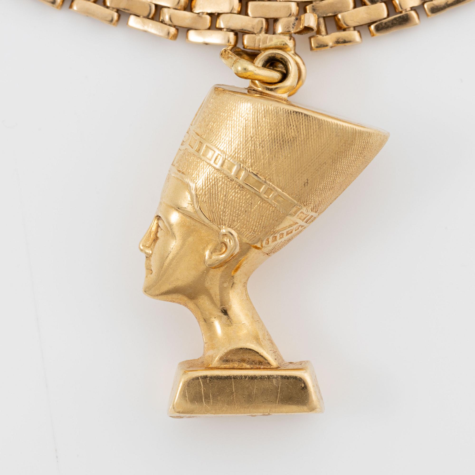 Armband med berlocker guld 18K guld.