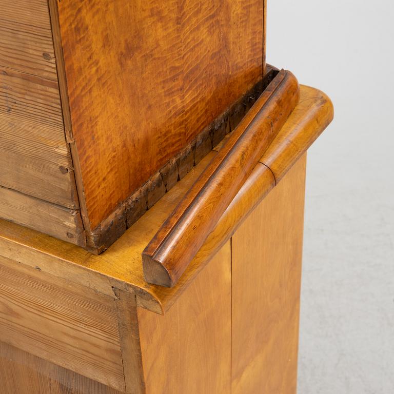 A birch wood veneered book cabinet early 20th Century.