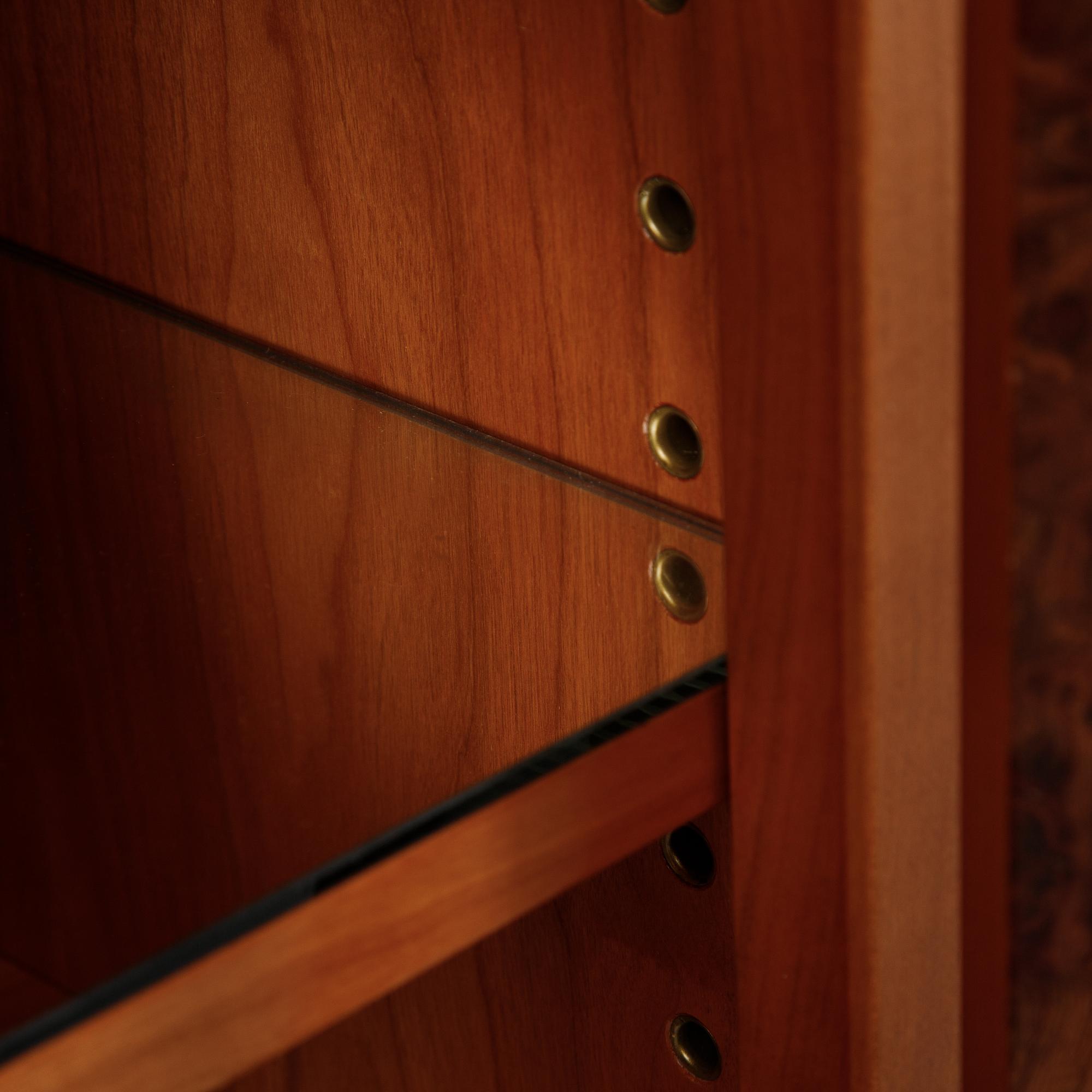 A model 2135 cabinet by Josef Frank for Firma Svenskt Tenn.