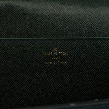 A 'Moskova' taiga leather briefcase from Louis Vuitton.