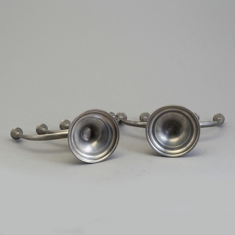 A pair of pewter candelabra from GAB, first half of the 20th century.