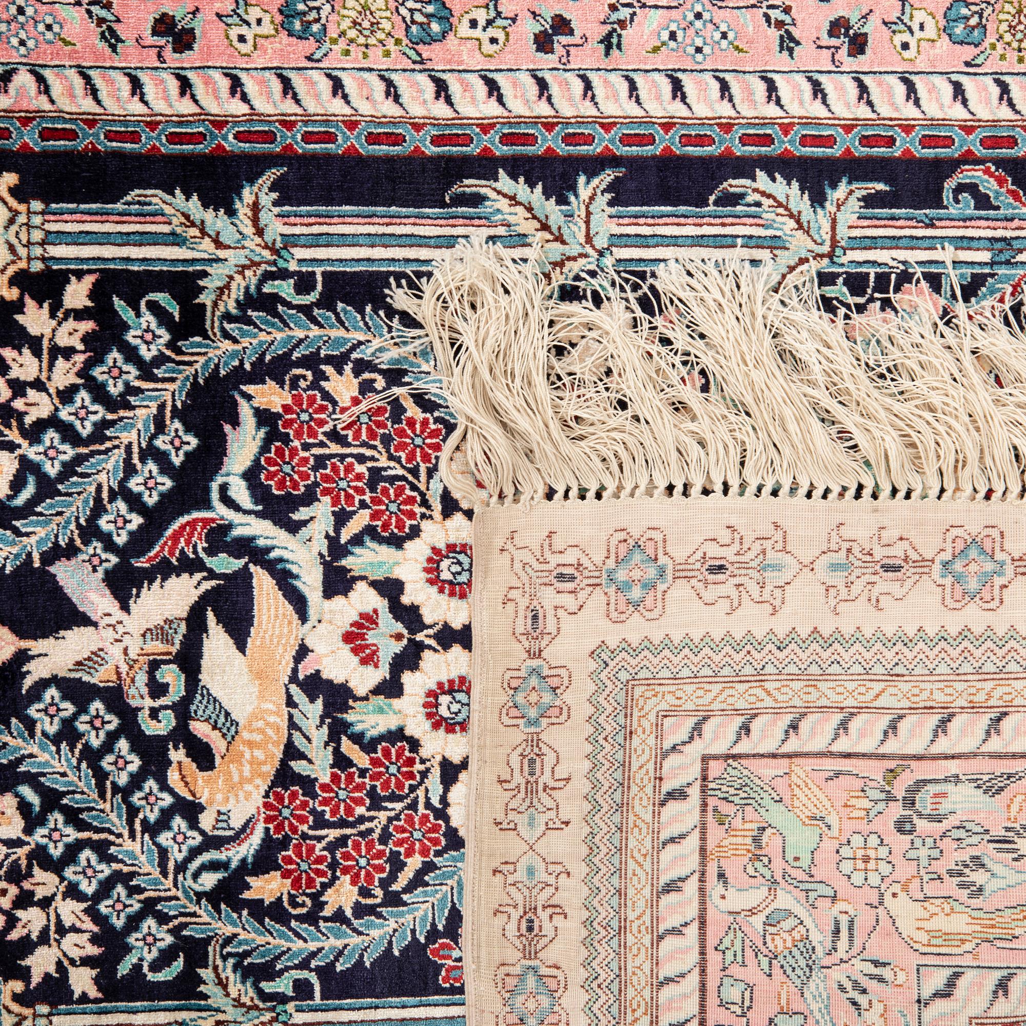 Oriental silk rug, approximately 122x77 cm.