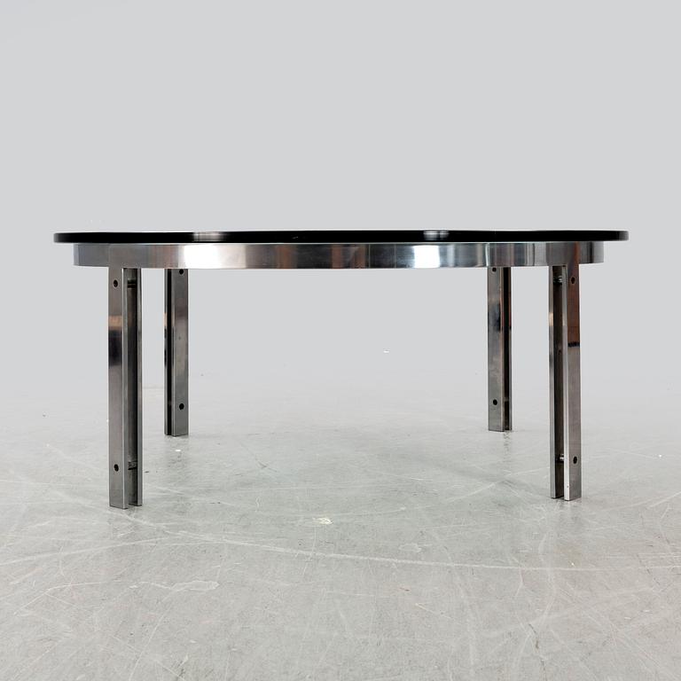 A glass and metal coffee table later part of the 20th century.