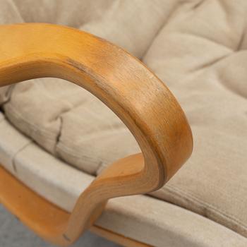 Bruno Mathsson armchair, "Pernilla" with footstool, Dux, late 20th century.