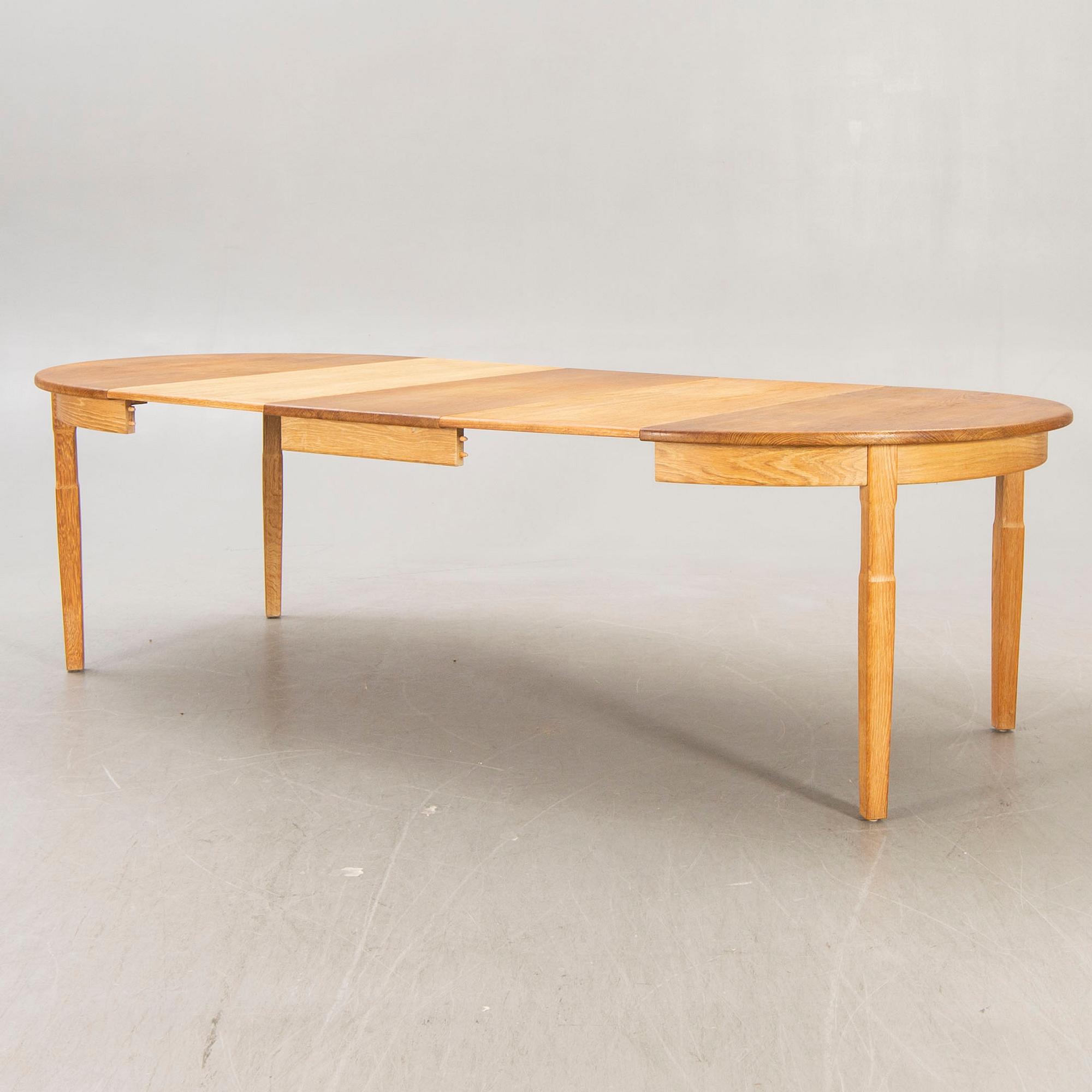 A Henning Kjaernulf, 1960s 7 pcs oak dining set, EG Möbler Danmark.