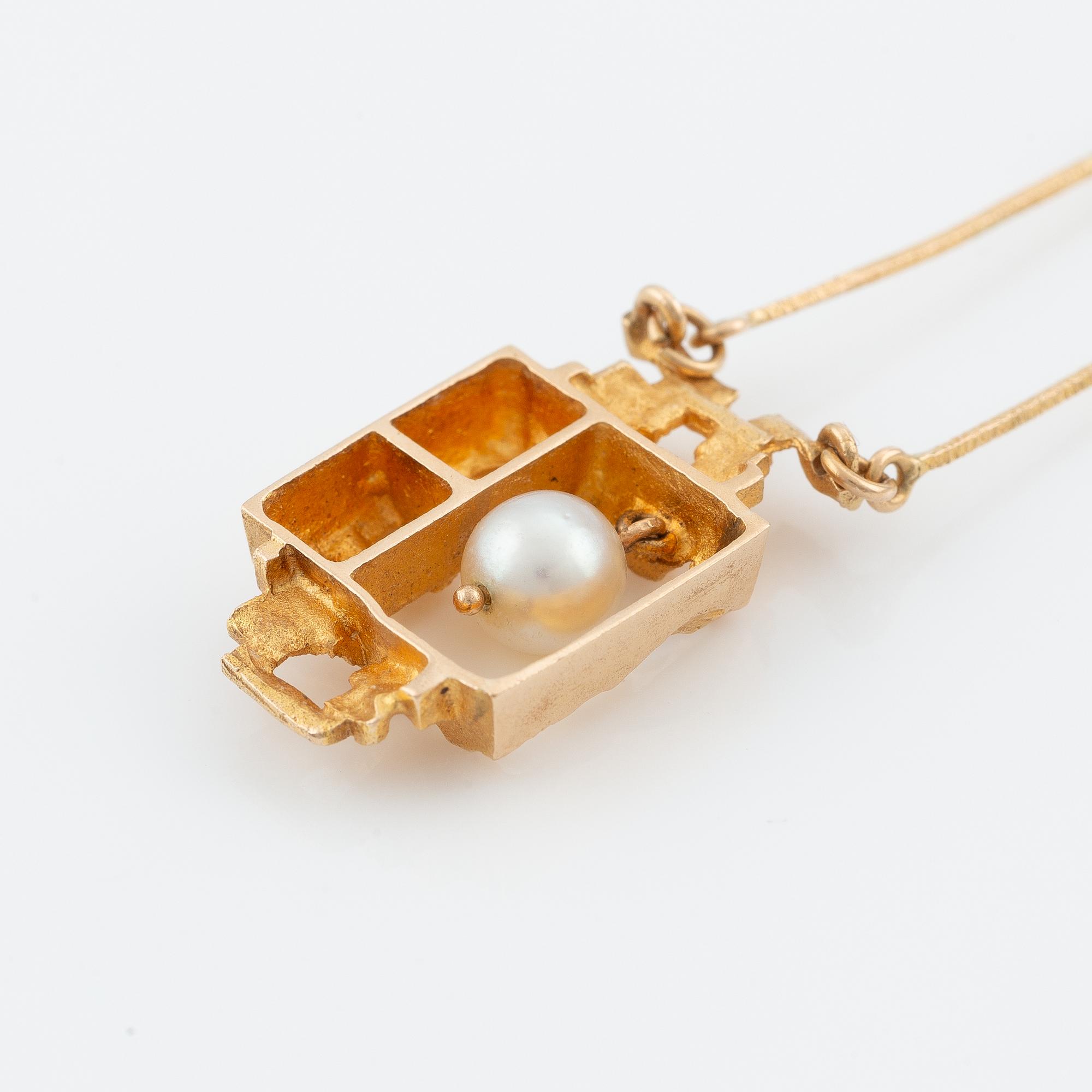 Lapponia, 14K gold necklace with a cultured pearl, designed by Björn Weckström "Magical Pearl".