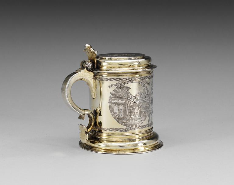 A GERMAN 17TH CENTURY TANKARD, unidentified marks. Russian engravings.