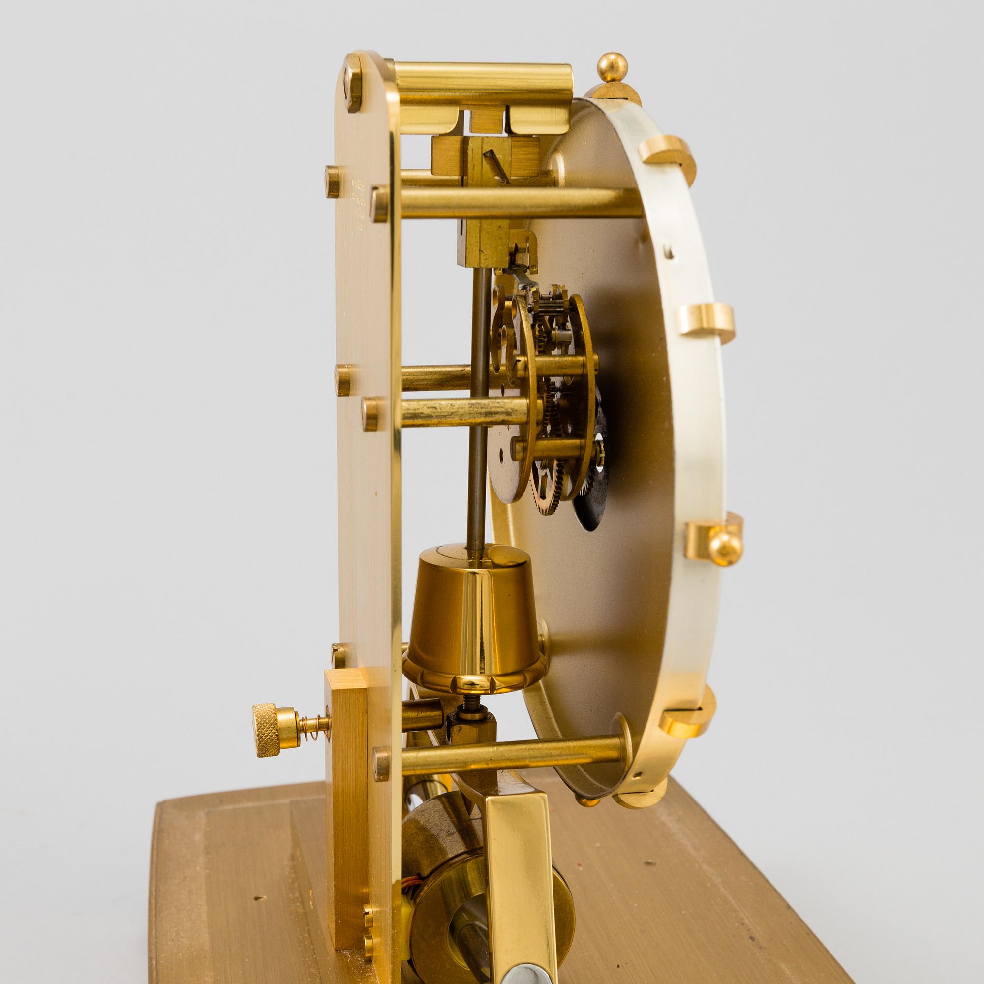 A table clocks, brass, Kundo, 20th century.