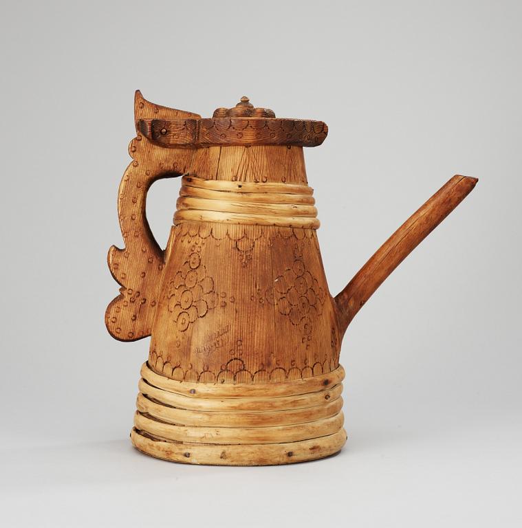 A 19th century wood jug.