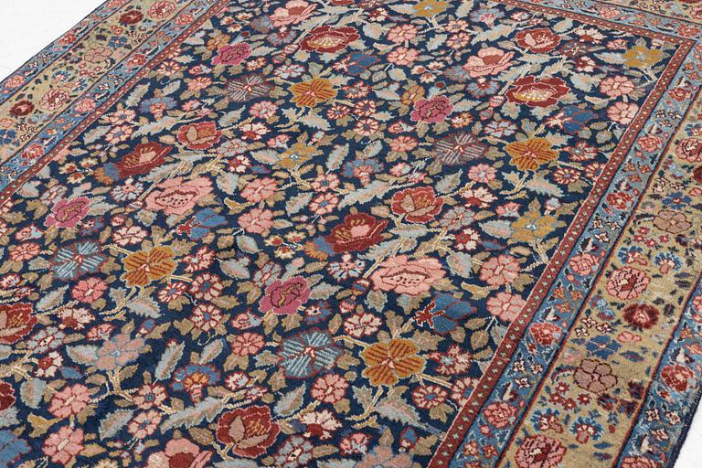 A rug, possibly Tabriz, c. 195 x 137 cm.