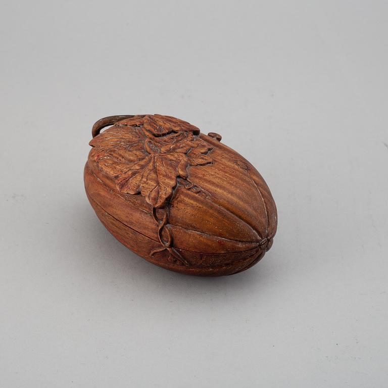 A melon shaped hardwood box, China, 20th Century.