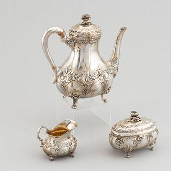 A rococo-style coffee pot, creamer and sugar bowl, swedish import mark, 20th century.