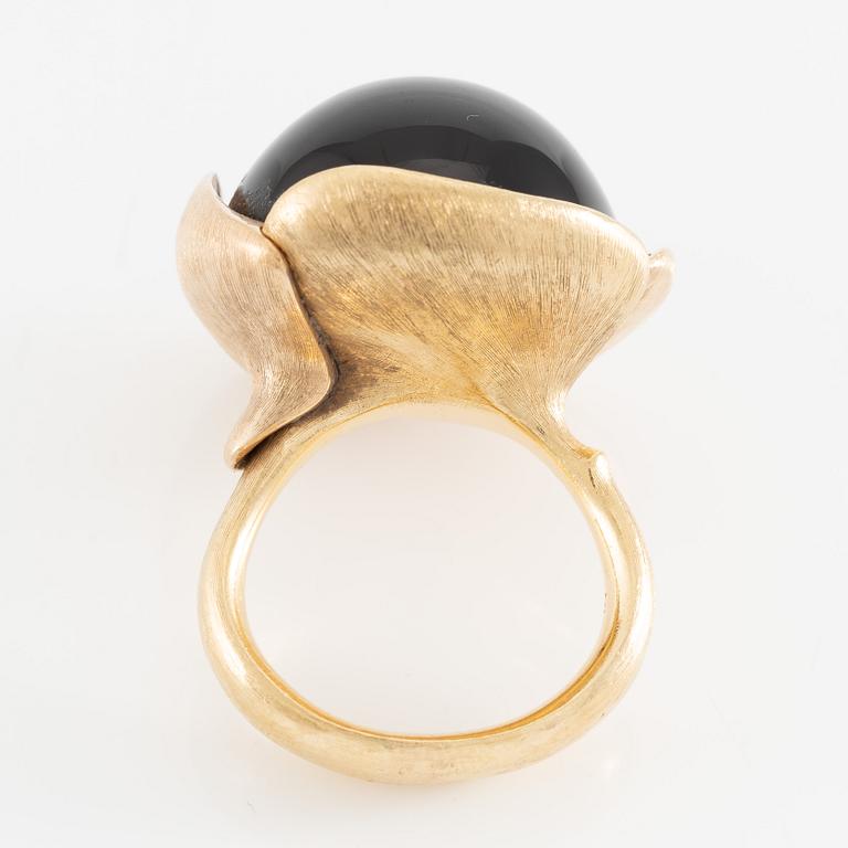 Ole Lynggaard, ring, large Lotus, 18K gold with cabochon-cut black stone probably onyx with brilliant-cut diamonds.