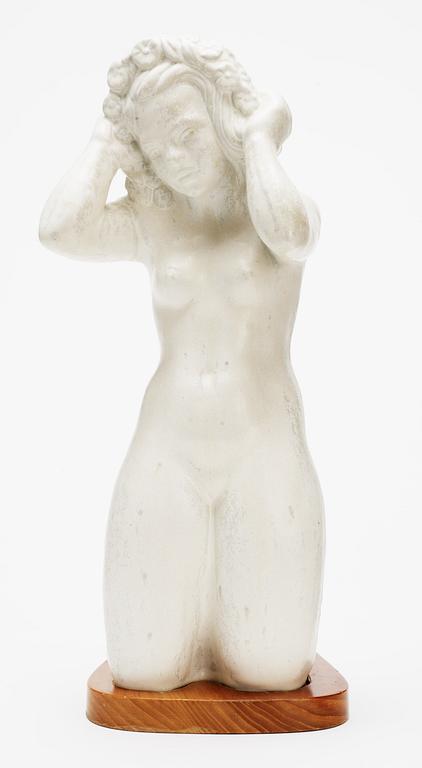 A Harald Salomon stoneware sculpture of a female in the nude, Rörstrand 1944.