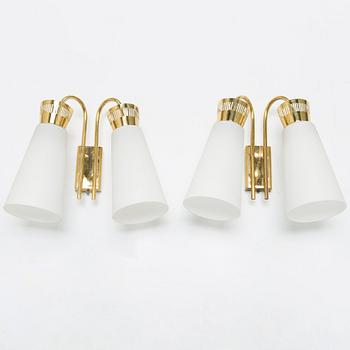 A pair of mid-20th century 'EY 60' wall lights for Itsu.