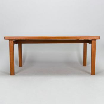 A mid-20th century dining table.