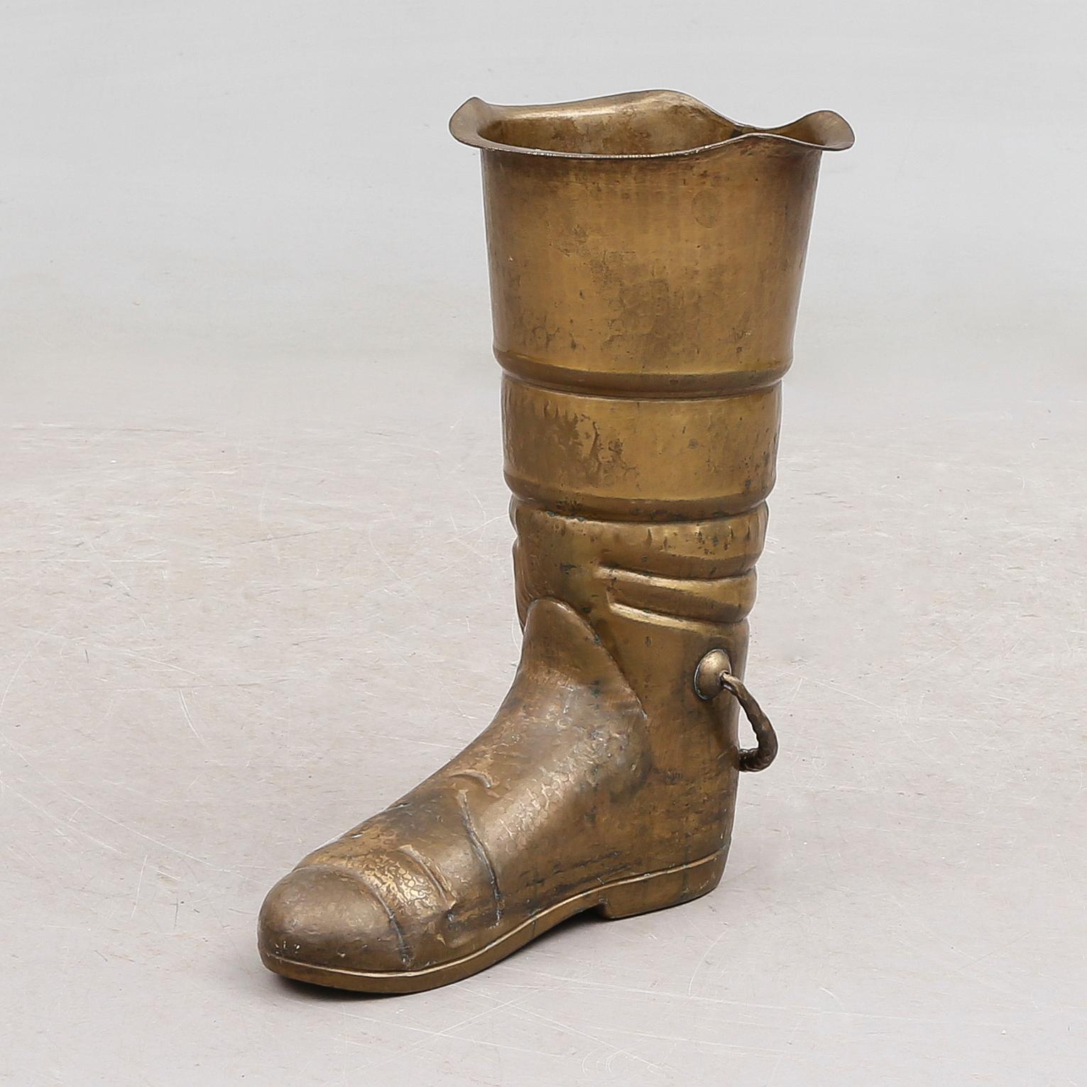 PARAPLYSTÄLL, mässing, 1900-talets första hälft.