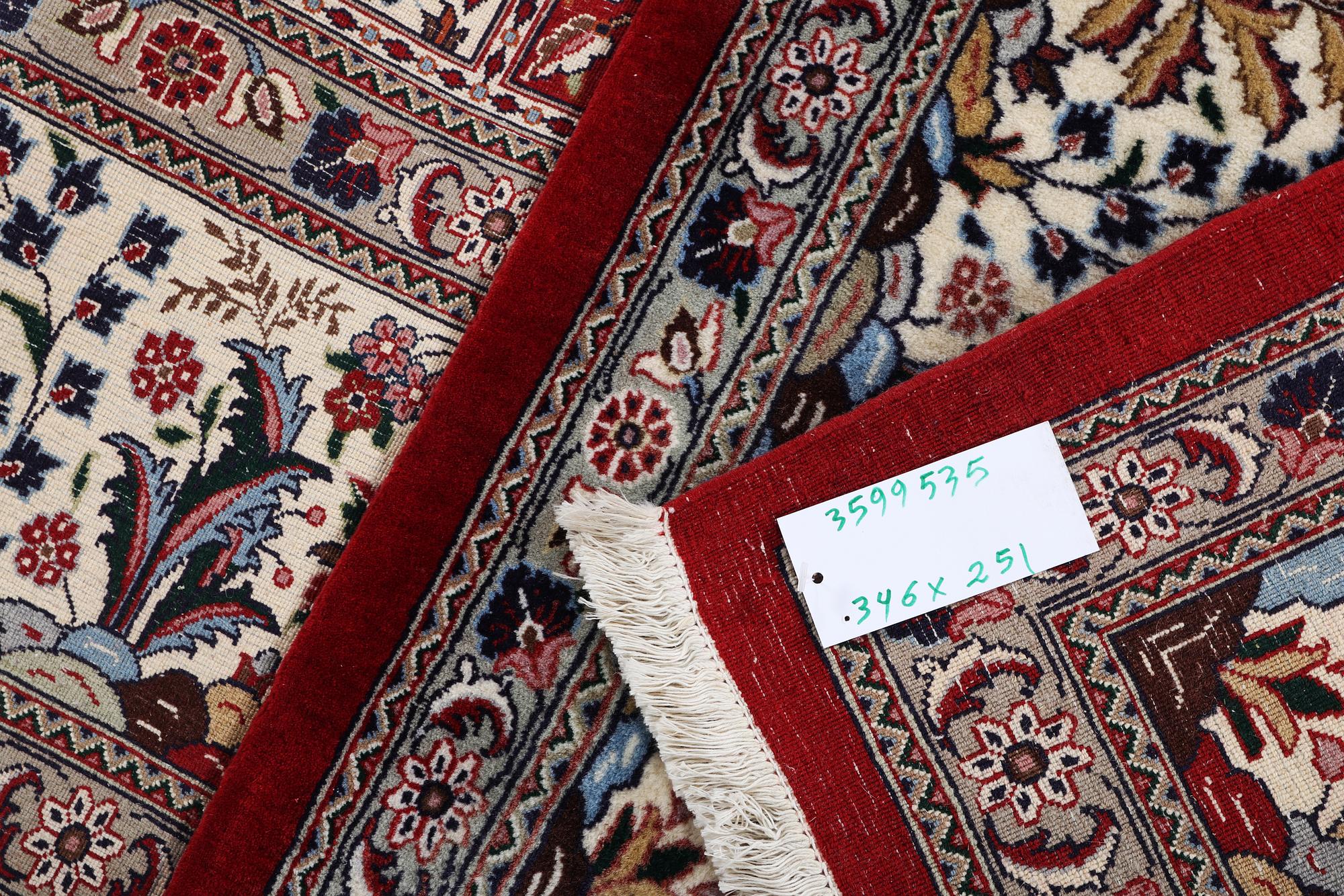 A carpet, Qum corck wool, ca. 346 x 251 cm.