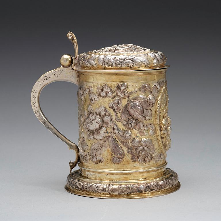 A German, probably Helmstedt late 17th century parcel-gilt tankard, unidentified makers mark.