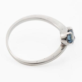 14K white gold ring with sapphire and small rubies.