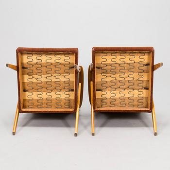 Ilmari Lappalainen, a pair of 1950s '2452' armchairs for Asko, Finland.