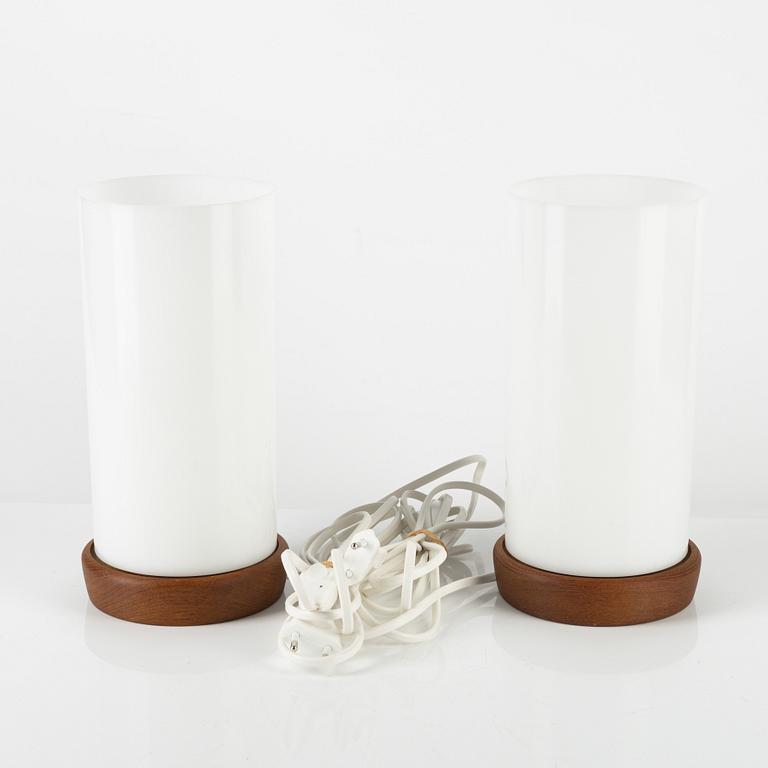 Uno & Östen Kristiansson, a pair of teak and acrylic table lights, Luxus, Vittsjö.