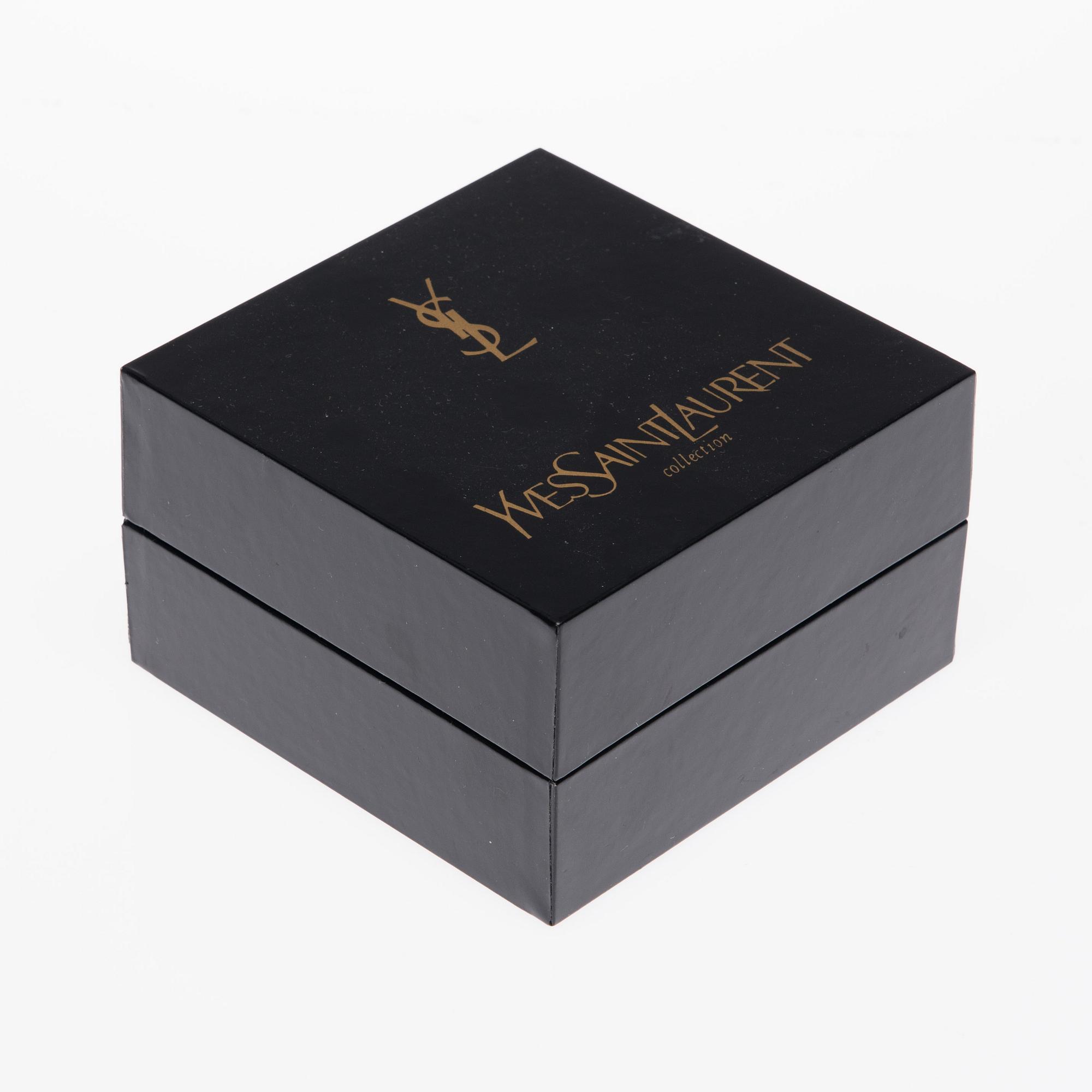 ARMBANDSUR, Yves Saint Laurent.