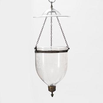 A glass ceiling lantern, around the year 1900.