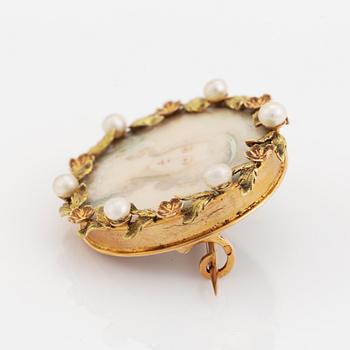Brooch with miniature portrait on mother of pearl.