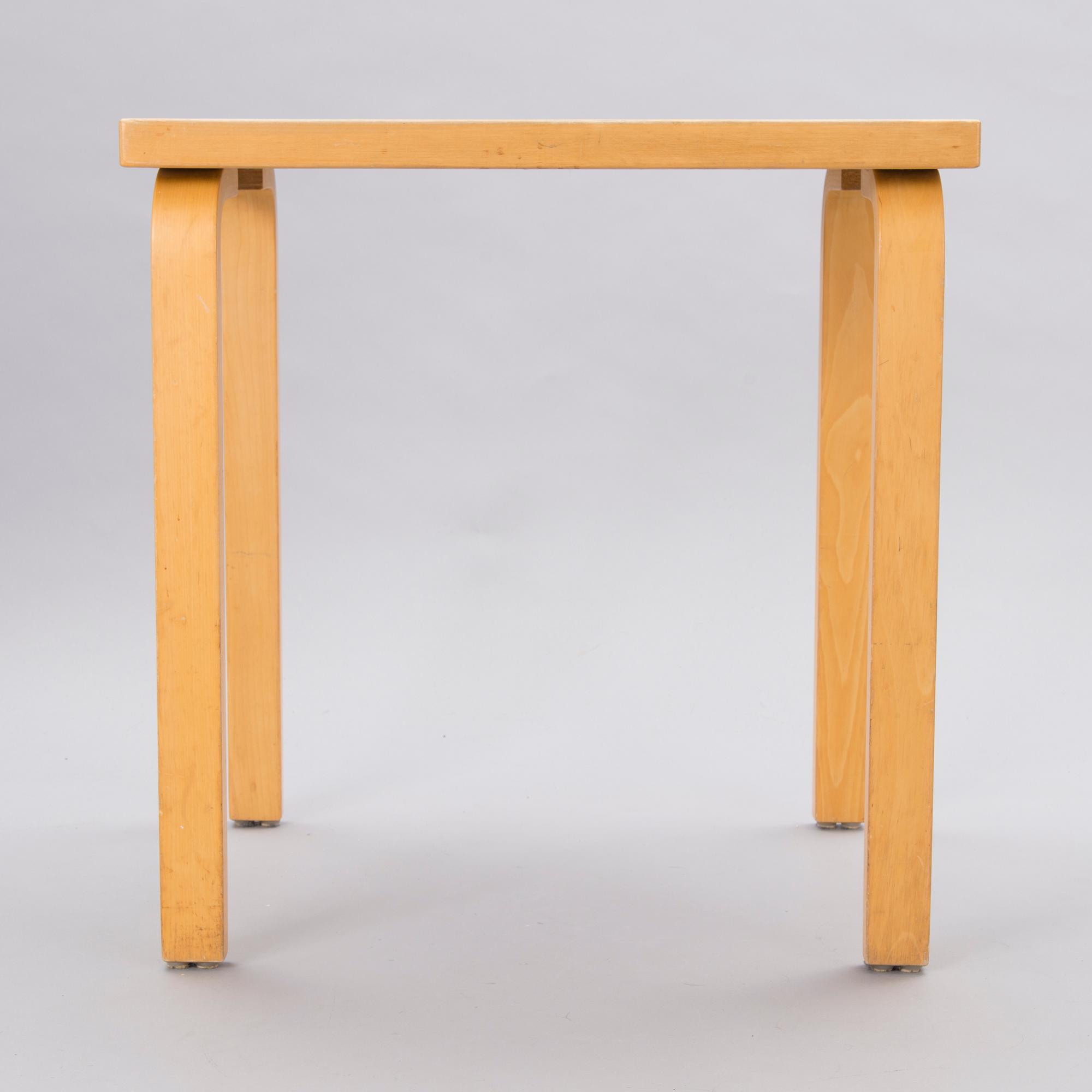 A mid-20th Century table, Artek.