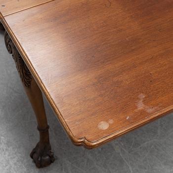 An English mahogany table, 19th Century.